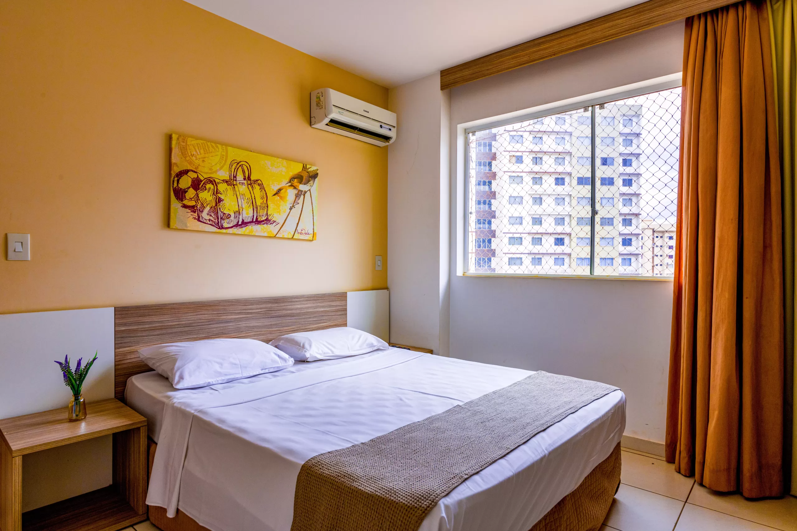 Quarto do Apartamento Luxo com cama king e ar-condicionado
